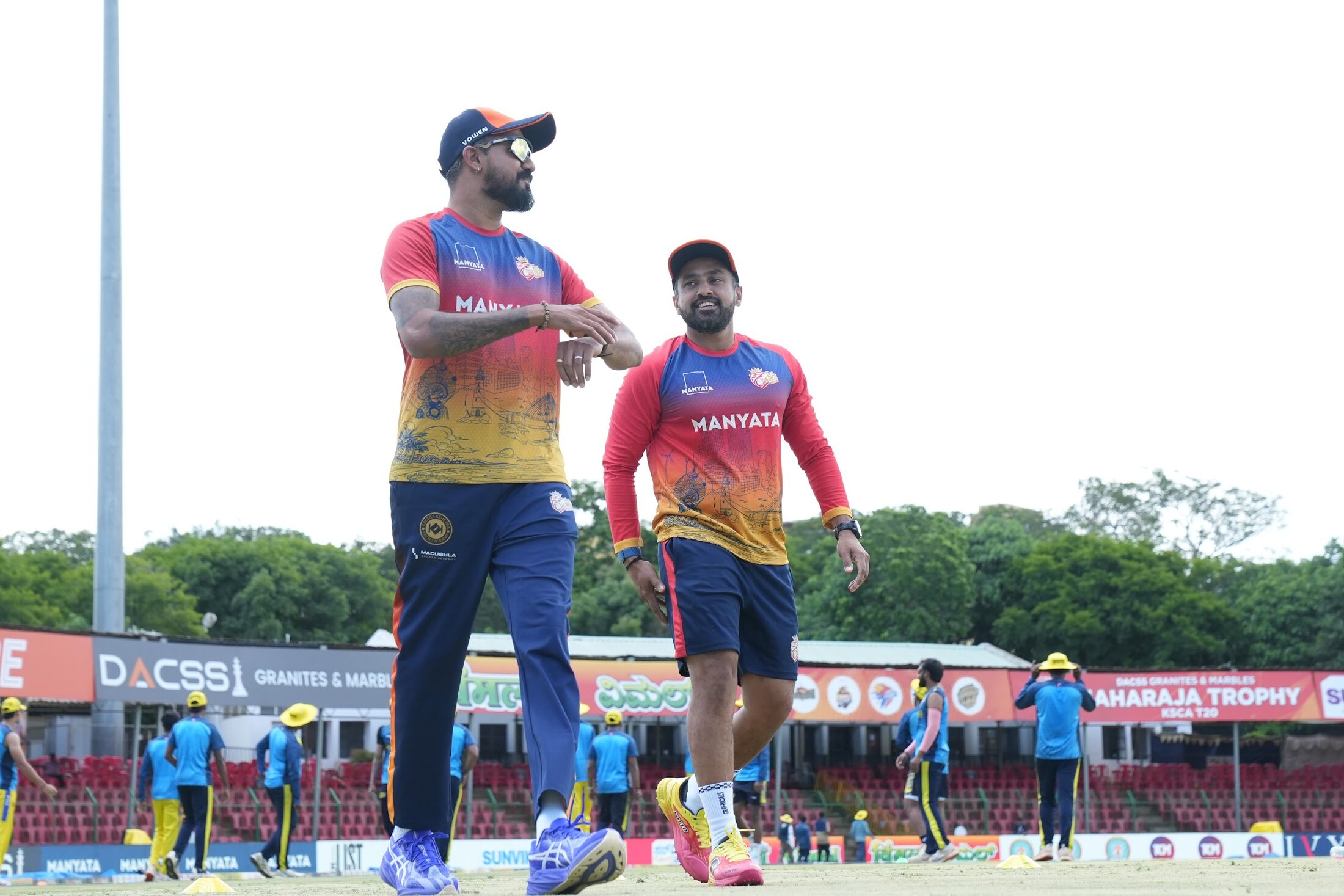 Kartik Achappa coaching during a cricket training session